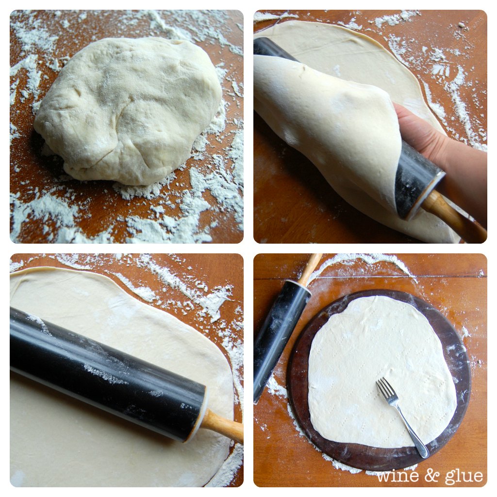 A collage of four photos that show how to roll out the pizza dough. With a lightly surfaced area, a ball of dough is rolled out to as thin as a coin. Then, with the rolling pin, the dough was rolled on to the pin and placed onto a pizza board where it was poked with a fork. 